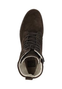 Bruine suède enkelboots met veters en een ritssluiting. Voering van zacht wit bont, met een ronde neus en een stevige zool.