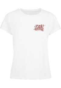 T-shirt en coton blanc à manches courtes, avec un design graphique en rouge portant le texte "Ozzy Osbourne" sur la partie gauche de la poitrine.