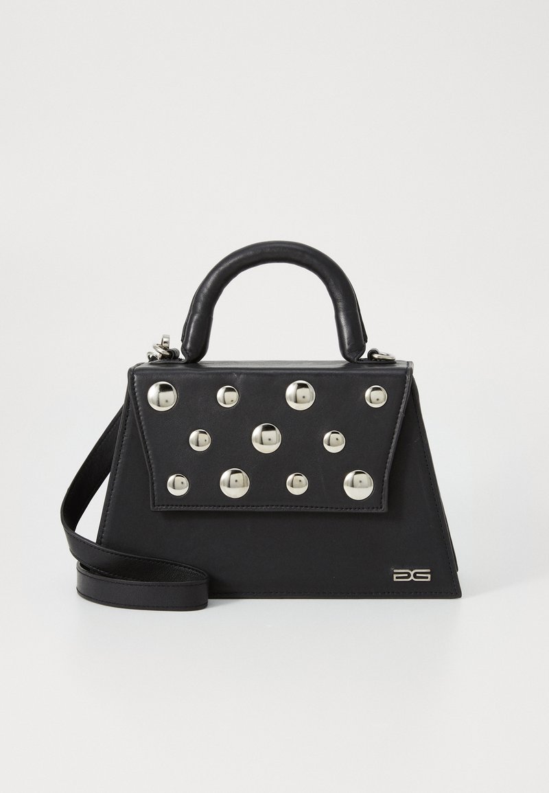 Black handbag with a structured shape, featuring a top handle, shoulder strap, and decorative metallic studs on the front.