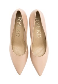 Light beige leather pointy-toed shoes with a smooth finish and gold logo inside. Soft-textured insole and streamlined design.