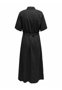 Melnas kleitas ar īsām piedurknēm, apkakles dekoltē, saistīts jostas siksna un plūstoša, līdz potītēm garuma siluets. Gluda auduma tekstūra.