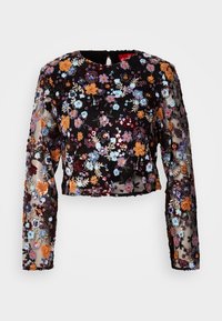 Haut noir court à manches longues en tissu transparent, orné d'une broderie florale multicolore et de sequins disposés selon divers motifs.