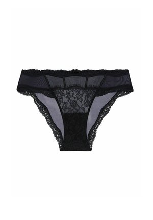 Tanga in pizzo nero con pannelli in rete trasparente, featuring un motivo floreale sul retro, cintura elastica e un piccolo fiocco decorativo davanti.