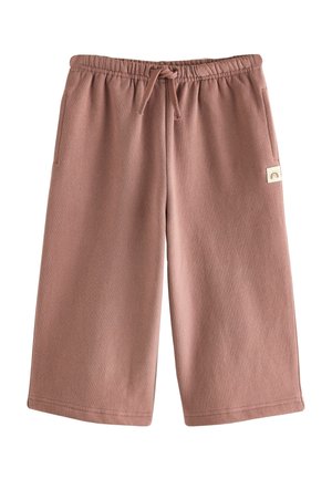 Pantalones cortos hasta la rodilla en color malva con cintura elástica, cordón ajustable, bolsillos laterales y una pequeña etiqueta de tela con un logo minimalista de arcoíris.