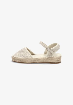 Sandalia plana beige tipo esparto con bordado floral, correa al tobillo con hebilla y suela de yute trenzado.