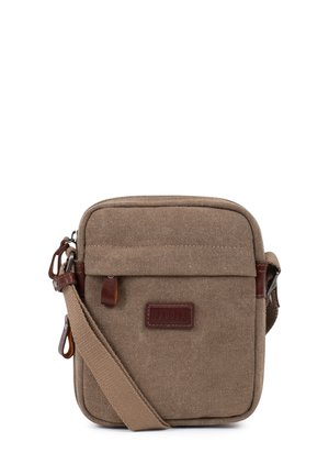 Sac bandoulière en toile marron avec poche avant à rabat, tirettes de fermeture éclair en cuir et sangle d'épaule réglable.