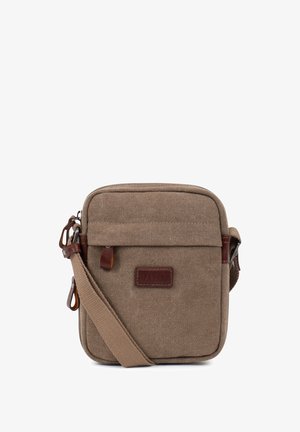 Sac bandoulière en toile marron avec poche avant à rabat, tirettes de fermeture éclair en cuir et sangle d'épaule réglable.
