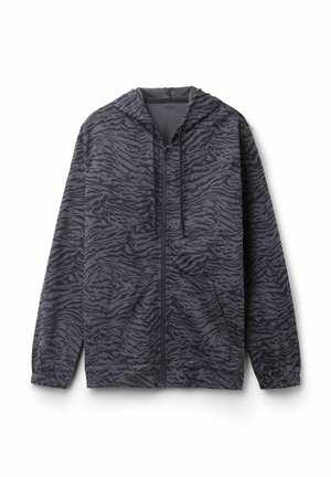 Veste à capuche gris foncé avec un motif à rayures de tigre. Comprend une fermeture éclair avant, deux poches et des poignets élastiques pour un ajustement parfait.