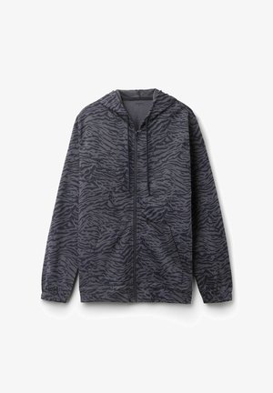 Kurtka z kapturem w ciemnoszarym kolorze z wzorem w paski tygrysa. Posiada przedni zamek błyskawiczny, dwie kieszenie oraz elastyczne mankiety dla lepszego dopasowania.