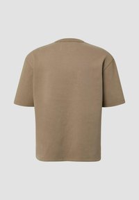 Khaki krótkim rękawem koszulka z miękkiej bawełny, o luźnym kroju, z okrągłym dekoltem oraz gładkimi, bezszwowymi plecami bez widocznych metek.