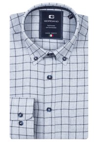 Grijze en witte geblokte shirt gemaakt van stof met een zachte textuur. Heeft een puntige kraag en donkere knopen, met een enkele knoopmanchet.