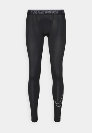 Leggings Nike Pro neri con un design aderente, vita elasticizzata con il testo "NIKE PRO" e un logo bianco in basso sulla gamba.