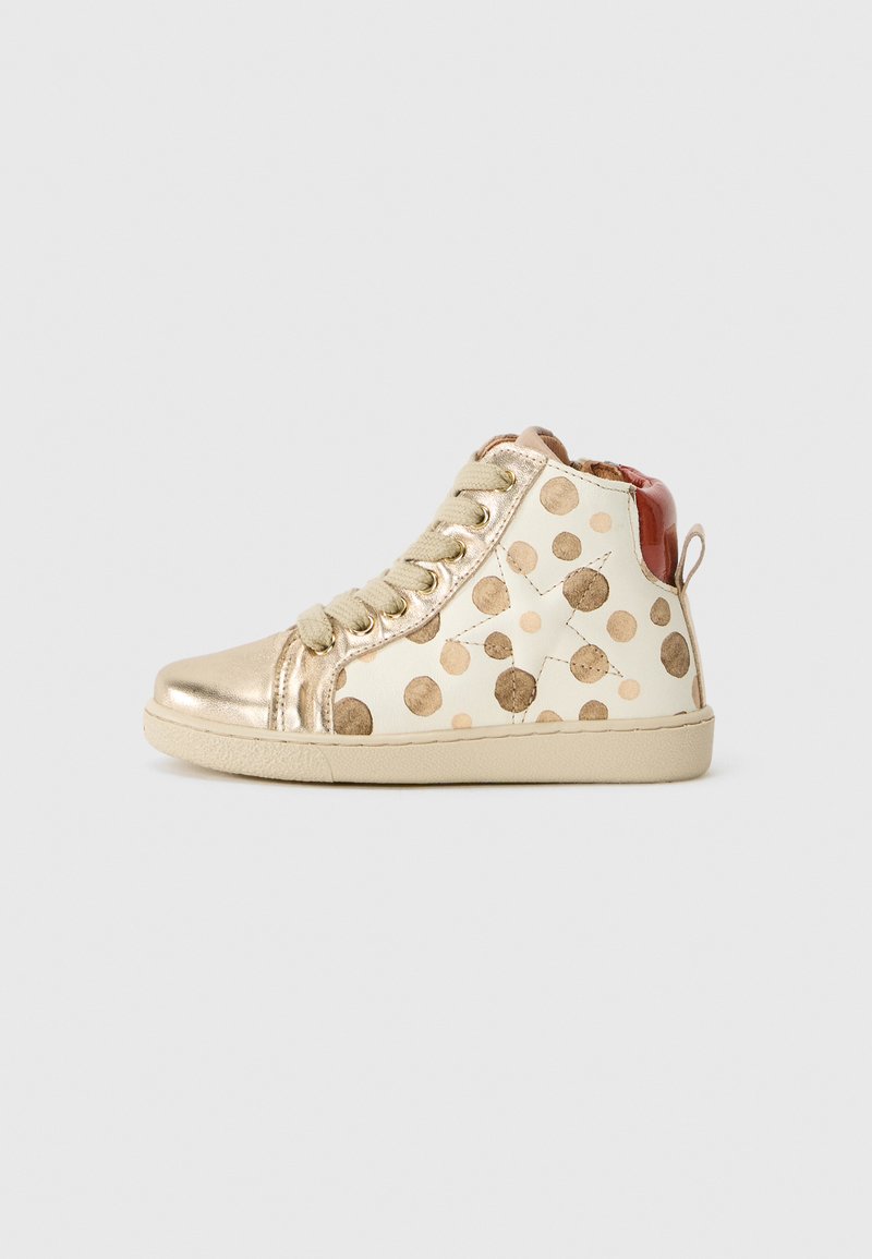 High-top sneakers in metallic gold and ivory leather with polka dot pattern, featuring a rubber sole and light green laces.