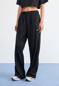 Nike Sportswear PANT COORD - Donji dijelovi trenirke - black