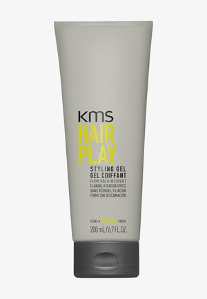 Tube de gel coiffant KMS Hair Play à tenue ferme, sans pellicules, 200 ml, contenant gris avec bouchon à clapet noir et texte jaune et noir.