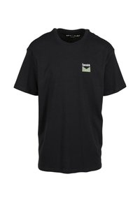 Black cotton t-shirt with short sleeves, crew neck, and a small green and white logo patch on the front left. Simple and unadorned design.