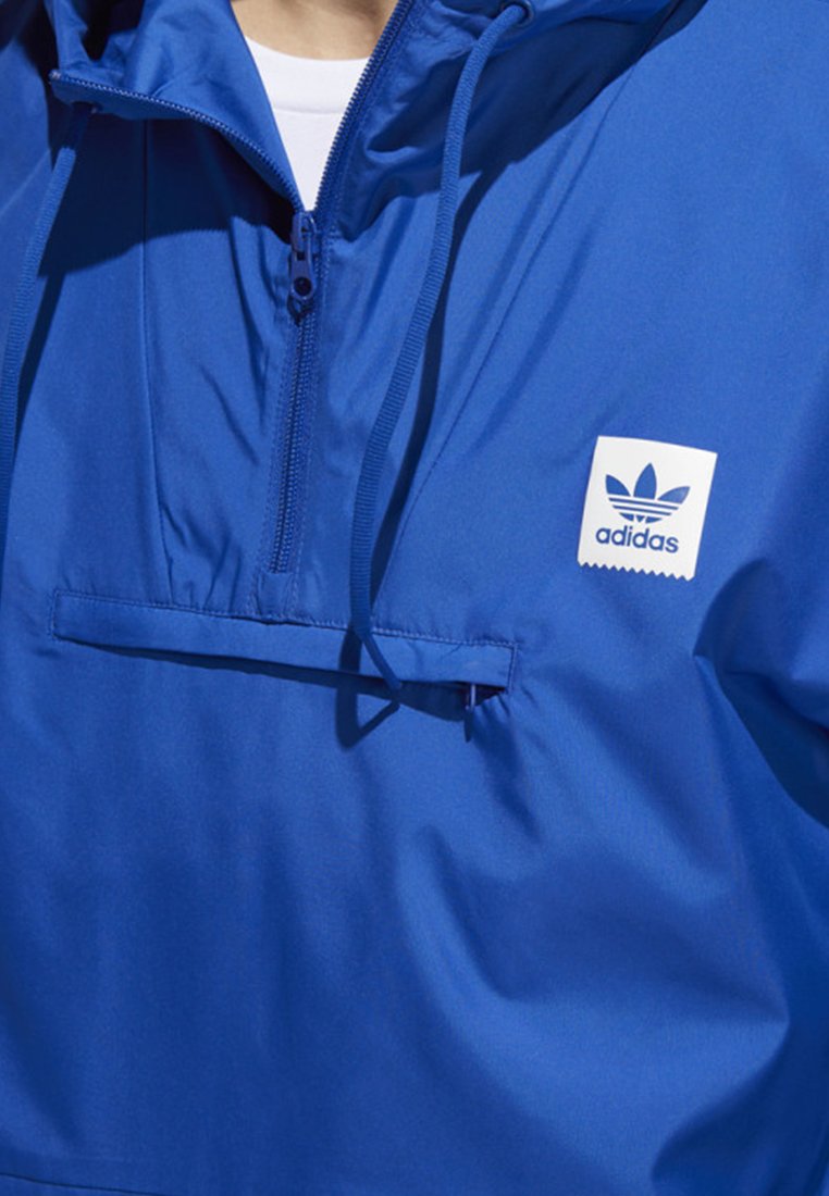 adidas hip packable jacket