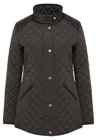 Quiltad mörkgrön jacka med hög krage, svarta axelaccenter, tryckknappar och sidofickor. Slät textur och diamantmönster.