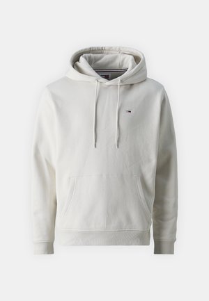 Huvtröja i off-white, tillverkad av mjukt tyg, med en framficka i känguru-stil och en liten logotyp på bröstet.