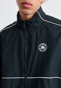 Converse RETRO CHUCK ELEVATED JACKET - Windbreakers - black