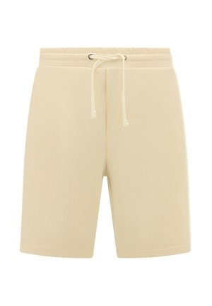 Beige shorts gemaakt van zacht materiaal, met een elastische tailleband en een aantrekkoord, twee zijzakken en een ontspannen pasvorm.