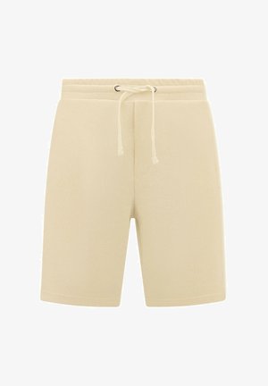 Beige shorts gemaakt van zacht materiaal, met een elastische tailleband en een aantrekkoord, twee zijzakken en een ontspannen pasvorm.