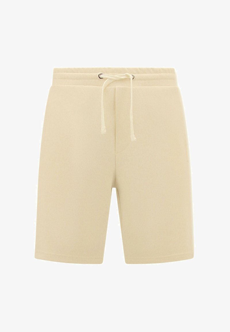 Beige shorts gemaakt van zacht materiaal, met een elastische tailleband en een aantrekkoord, twee zijzakken en een ontspannen pasvorm.