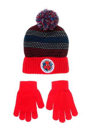 Bonnet tricoté noir, rouge et bleu avec un pompon et un écusson Spider-Man blanc. Comprend des gants rouges assortis avec des poignets en tricot.