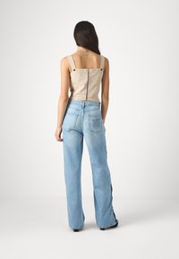 Guess Pernera ancha - daydreamz