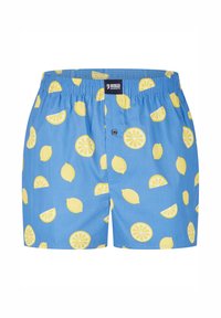 Blauwe boxers met een citroenpatroon, met halve schijfjes en hele citroenen. Elastische tailleband, knoopsluiting en een lichte stof.
