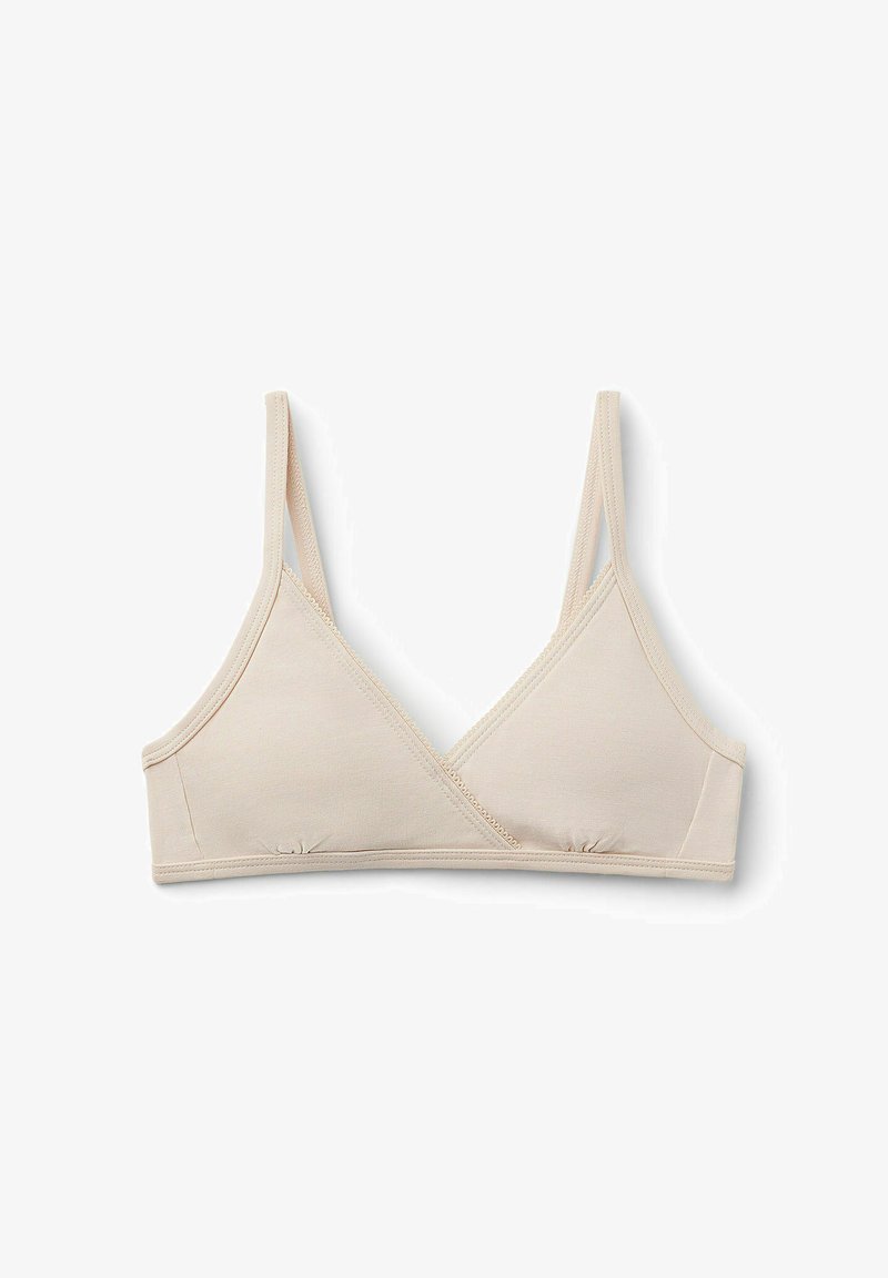 Bralette en coton beige avec une forme triangulaire, des fines bretelles ajustables et un centre froncé pour un soutien supplémentaire. Texture lisse sur l'ensemble.
