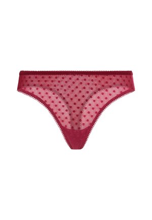 Rode sheer string met een stippenpatroon en een kanten rand met een golvende afwerking op de taille, met een gladde voering aan de voorkant.