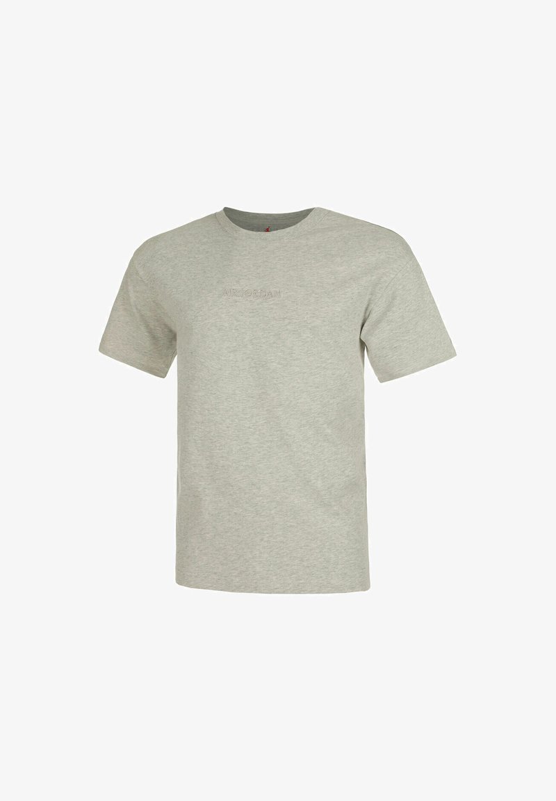 T-shirt gris à manches courtes en coton. Il présente un col rond et un logo 'AIR JORDAN' brodé de couleur assortie.