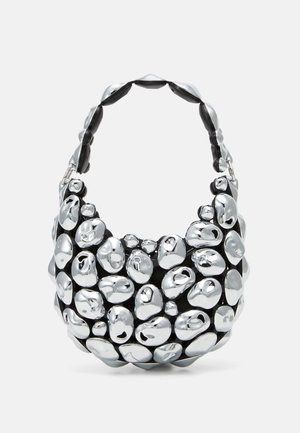 Metallic silver and black bag, with rounded, pebble-like textures. Features a thick, curved handle and smooth, reflective surface.
