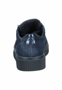 Navy blue suede sneaker with a glossy black heel accent, round toe, and textured black rubber sole. Rear and interior view shown.