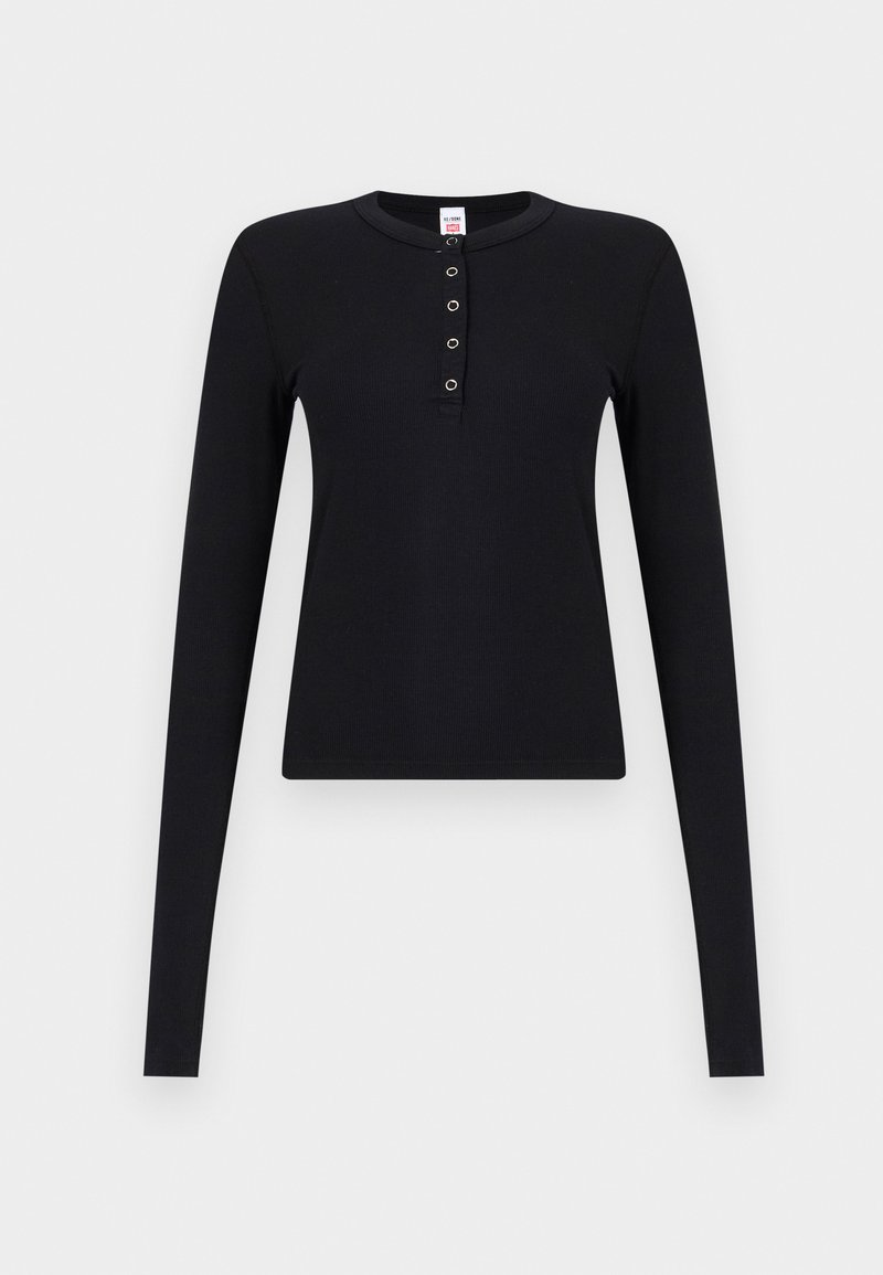 Black long-sleeve ribbed henley top with five silver snap buttons along the front placket and a crew neckline.