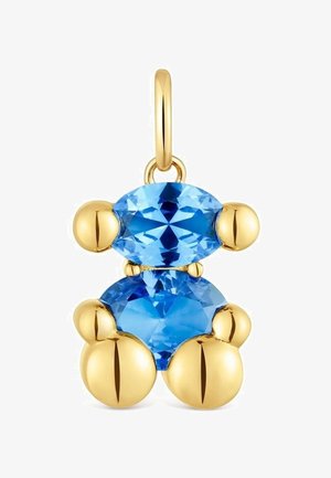 Colgante en forma de oso de peluche de oro con cuerpo y cabeza de gema azul facetada, que incluye un pequeño lazo de oro para su sujeción.