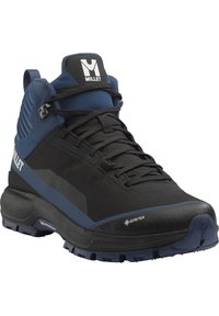 Chaussure de randonnée noire et bleu marine avec une étiquette Gore-Tex, un tissu texturé et un système de laçage bien en vue. Présente une semelle robuste pour une bonne adhérence.