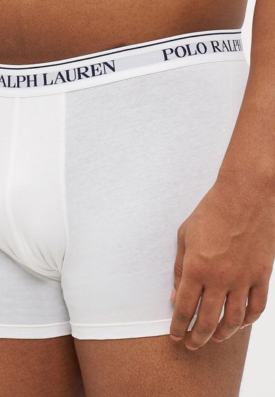Fehér pamut boxer alsónadrág, tengerészkék és fehér "POLO RALPH LAUREN" logós derekú. Simaság és testhez álló kialakítás.