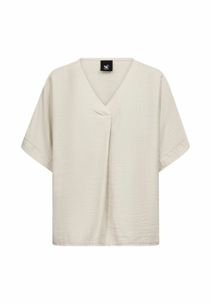 Beež lühikeste varrukatega särk V-kaelusega ja lahtise lõikega. Valmistatud tekstuurse kangaga, millel on õrn läige, esiosas voldik ja logomärgiga silt.