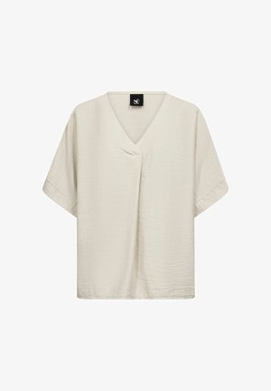 Beež lühikeste varrukatega särk V-kaelusega ja lahtise lõikega. Valmistatud tekstuurse kangaga, millel on õrn läige, esiosas voldik ja logomärgiga silt.