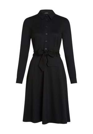 Black long-sleeve dress with a collar, button front, and a tied waist belt. Smooth fabric, flared skirt, and classic design.