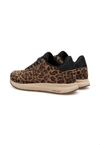 Leopard print sneakers, featuring a brown and black pattern, textured fabric, black accents, and a light-colored sole with "NATURAL SOFT" label.