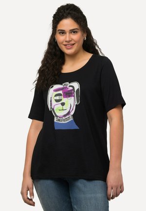 T-shirt en coton noir avec un graphique coloré représentant un visage de chien stylisé. Les manches courtes et l'encolure ronde complètent le design.