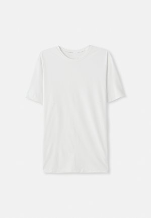 White short-sleeve t-shirt made of soft fabric. Features a crew neckline and a relaxed fit with stitched detailing across the front.