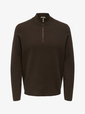 Brown zip-neck sweater with long sleeves, made of soft knit fabric. Features a high collar and minimal detailing.