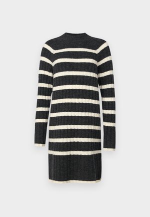Robe en tricot avec des rayures horizontales noires et blanches, texture côtelée, manches longues et col haut. Tissu doux et longueur mi-cuisse.