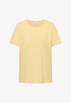 Lysegul T-shirt med korte ærmer, rund halsudskæring, lige kant og lille mærkat på indersiden af kraven med teksten "CECIL".