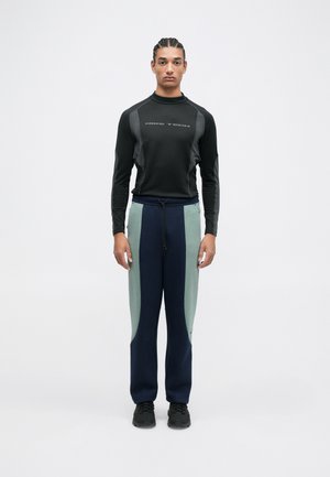 TECH PRO PANT - Tracksuit bottoms - obsidian/clay green/black