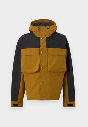 Veste à capuche bicolore marron et noire avec boutons-pression à l'avant, grandes poches poitrine à rabats et sangles de poignet réglables.